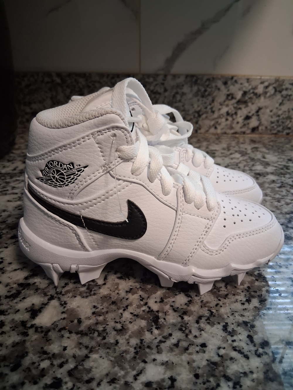 Brand New Jordan Kids' White High-Top Cleat with Black Swoosh Size 10